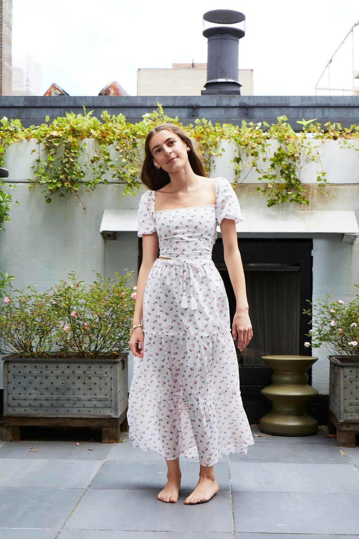 The Bella Rose Maxi with Tassels from Theme. It is the so beautiful with the all over dot dobbie material and tassel detail.
