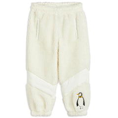 Penguin Pile Pants by Mini Rodini. Pile fleece pants made from 100% recycled polyester with an embroidered Penguin patch