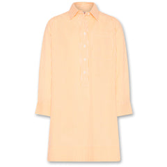 The Hedy Dress Beck from AO76. This chic, striped shirt dress in soft yellow and white offers a relaxed yet polished look.