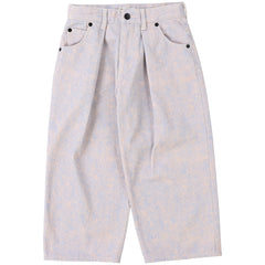 The Random Printed Pants from Fith. Wide-leg denim pants in a pale pink and lavender wash with pleated front.