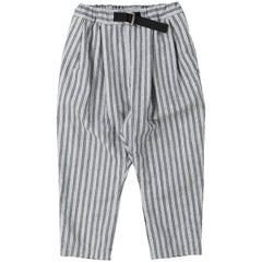 Indigo Herringbone Striped Pants by Fith. Striped tapered pants in grey and navy with front pleats, an integrated belt.