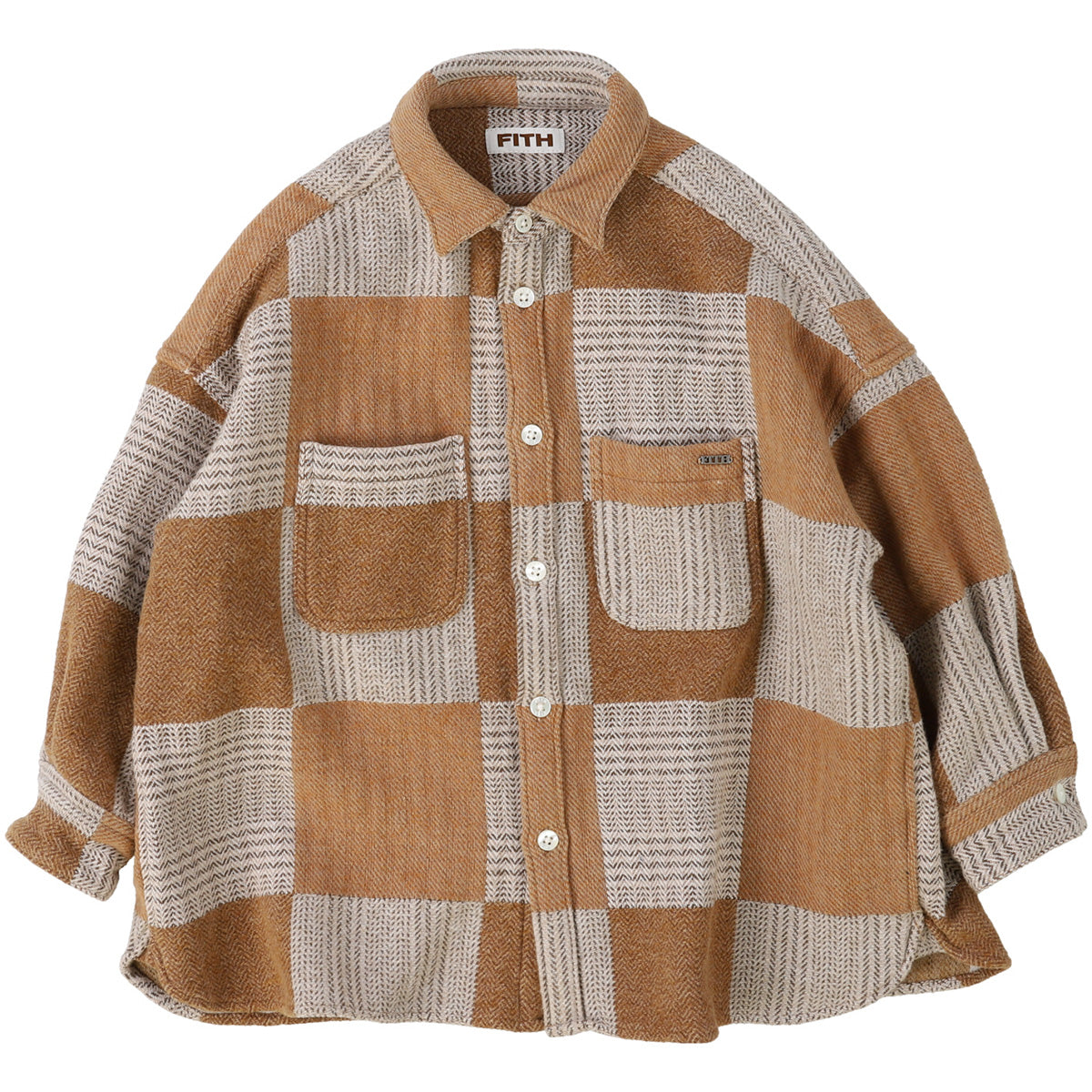 The Tweed Cotton Plaid Shirt from Fith. This is a cozy oversized flannel-style shirt featuring a large checkered pattern.