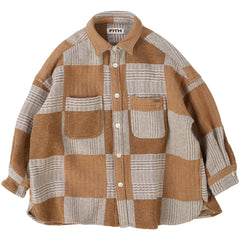 The Tweed Cotton Plaid Shirt from Fith. This is a cozy oversized flannel-style shirt featuring a large checkered pattern.