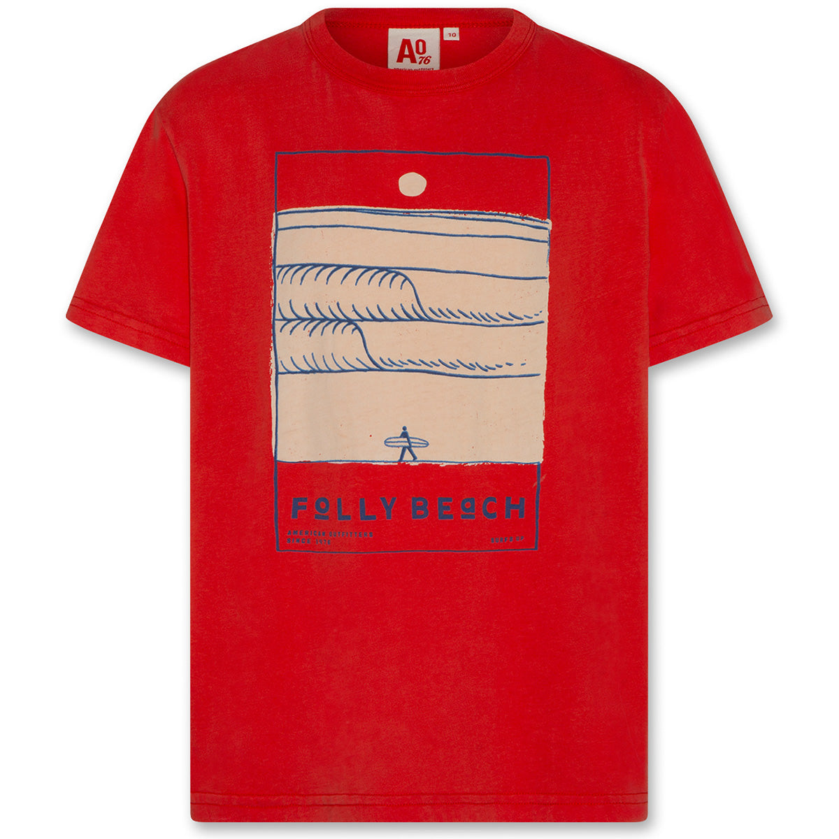 The Mat Tee Folly by AO76, a red short-sleeve T-shirt with a front graphic showing waves, a surfer, and “Folly Beach” text in blue and cream tones.