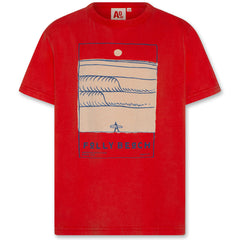 The Mat Tee Folly by AO76, a red short-sleeve T-shirt with a front graphic showing waves, a surfer, and “Folly Beach” text in blue and cream tones.