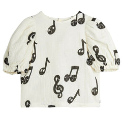 The Note Muslin Blouse from Mini Rodini. Kids blouse in a all over Note pattern with puff sleeves and snap buttons in the back.