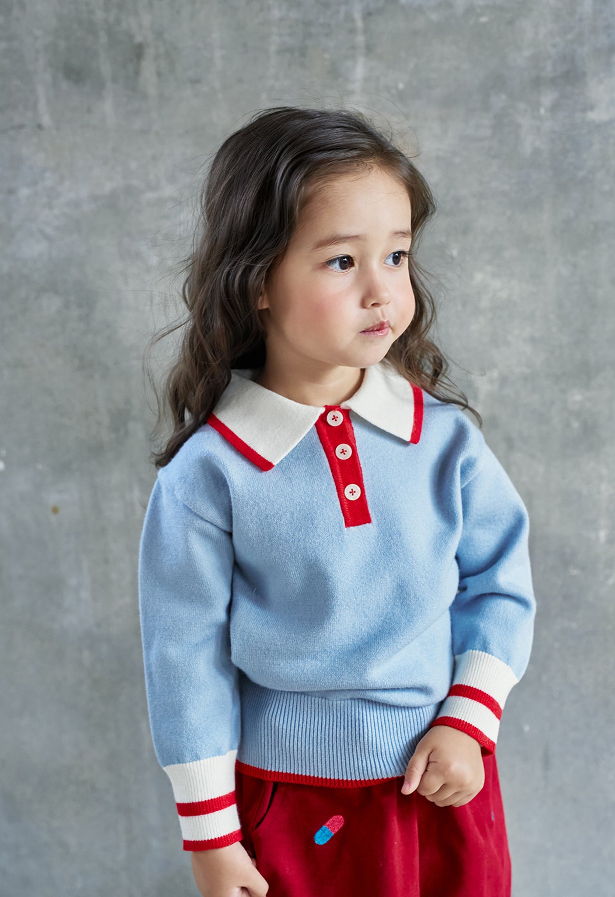 Momohanipopo Bluegrey Collar Knit Top with off-white collar, red button placket, and stripe-trimmed ribbed cuffs.