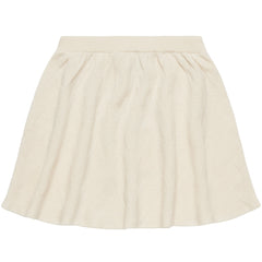 The Harlekin Skirt from FUB featuring a harlequin structured pattern, wide elastic waistband, and gentle flared fit.