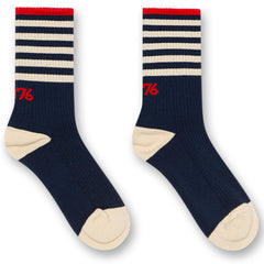 The Billie Socks B from AO76. Ribbed crew socks with contrast heel and toe, bold horizontal stripes at the cuff.