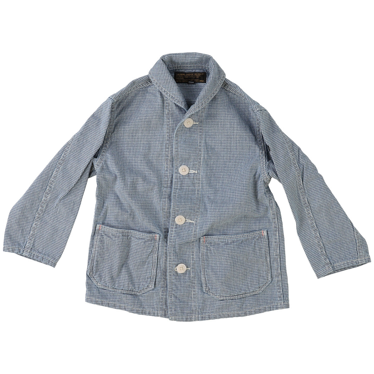 The Indigo Houndstooth Jacket from Denim Dungaree. tBlue checkered jacket with button details.