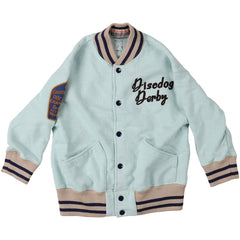 The 1959 Sweat Jacket by Denim Dungaree. Mint green kids’ varsity jacket with navy text embroidery and sleeve patch.