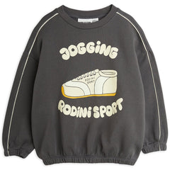 The Jogging Sweatshirt from Mini Rodini. Relaxed fit sweatshirt with ribbed trims and white pipings.