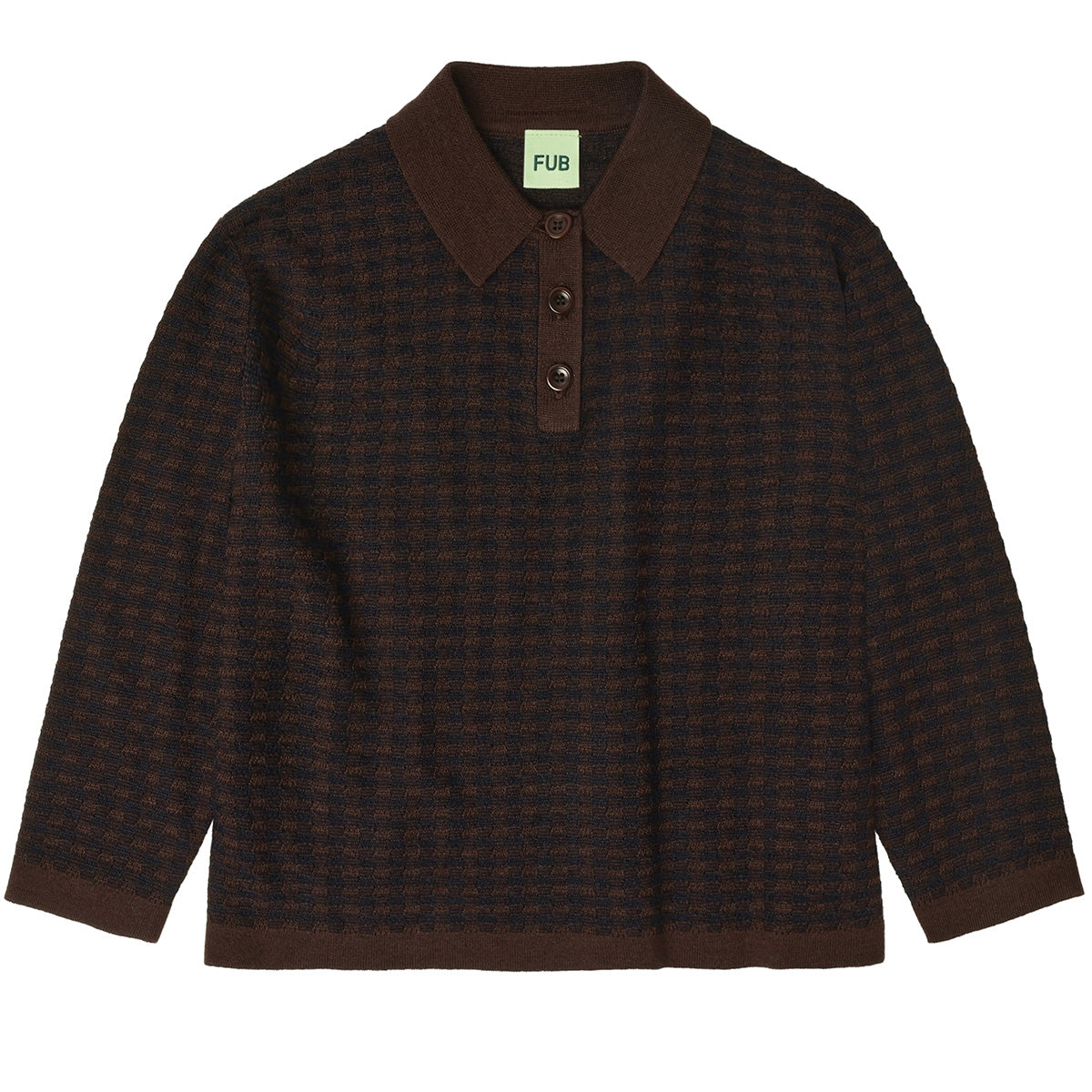 The Checked Polo from FUB. It features a flat shirt collar, folded hems, and a front button closure with corozo nut buttons.