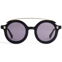 The Visor Sunglasses from Mini Rodini. UV-protective sunglasses made from handmade plant based bio-acetate.