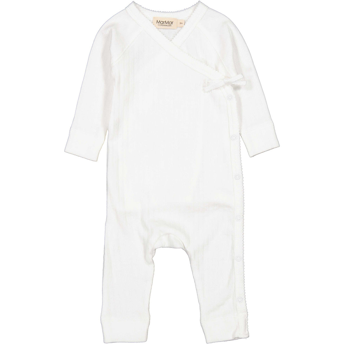 The Rula Jumpsuit from MarMar Copenhagen. Long-sleeved jumpsuit for newborns. The jumpsuit has a wrap-around closure.