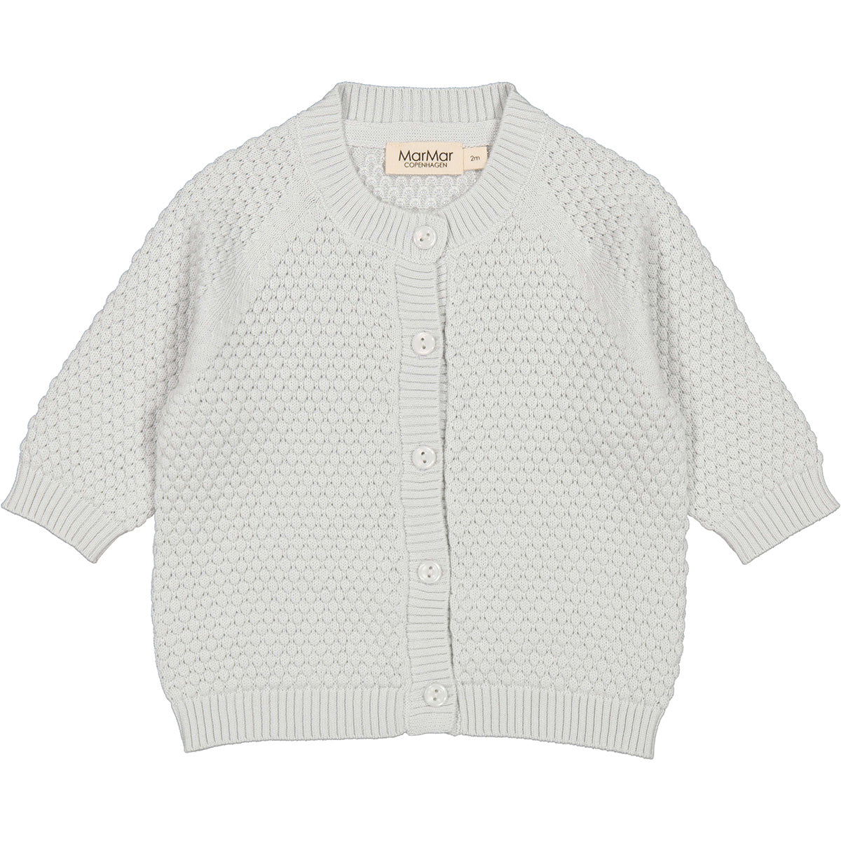 The Taki Knit Cardigan from MarMar Copenhagen. Knit cardigan with raglan sleeves, and button closure.