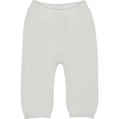 The Pira Pants from MarMar Copenhagen. Knitted pants for baby with elastic waist. The knitted pants have knit pattern details.