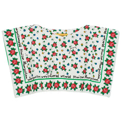 The Mumbai Flowers Top from Maison Mangostan in white is a bandana-style top with a flower print.