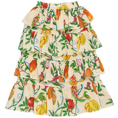 The Passion Fruit Skirt from Maison Mangostan in beige with multiple ruffles and an allover passion print.
