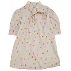 The Dress Bow from Long Live the Queen. This is a charming polka dot dress with a soft beige base and pastel-colored dots.