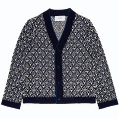 The Wool Cardigan Noel from Paade Mode. Geometric patterned cardigan with navy trim on a white background.
