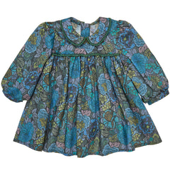 The Cotton Baby Dress Beatrice from Paade Mode. Floral print dress with puff sleeves, and a rounded Peter Pan collar.