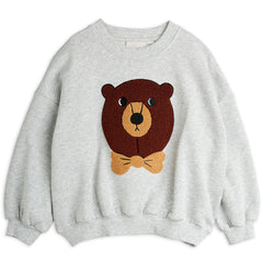 The Bear Chenille Sweatshirt from Mini Rodini. Decorated with a large chenille bear patch.
