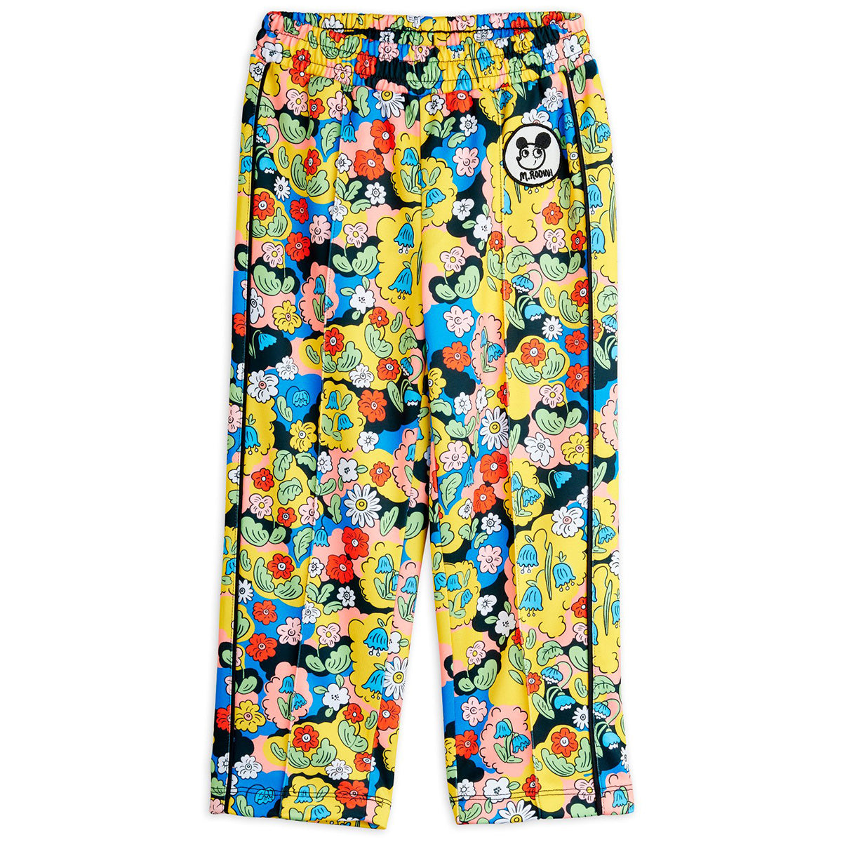 The Ritzratz Track Pants from Mini Rodini. Colorful floral-patterned pants.