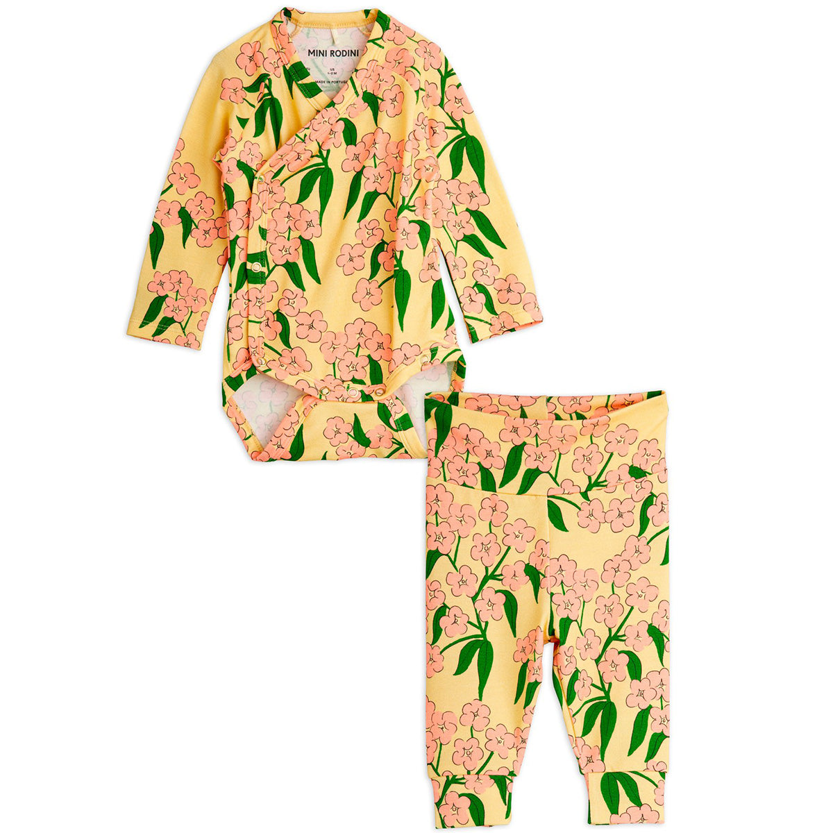 Alpine Flowers Newborn Set by Mini Rodini. Set for newborns with a wrap bodysuit and a pair of leggings in floral prints.