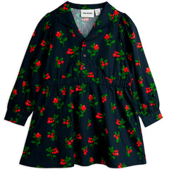 The Lingonberries Woven Long Sleeve Dress from Mini Rodini. Woven long sleeved dress in an all over lingonberries print.