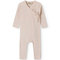 MarMar Copenhagen Rula jumpsuit in soft beige ribbed cotton, baby wrap romper with snap buttons and tie closure