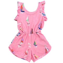 Maison Mangostan Barcos Towel Jumpsuit in pink terry with colorful sailboat print and ruffle sleeves