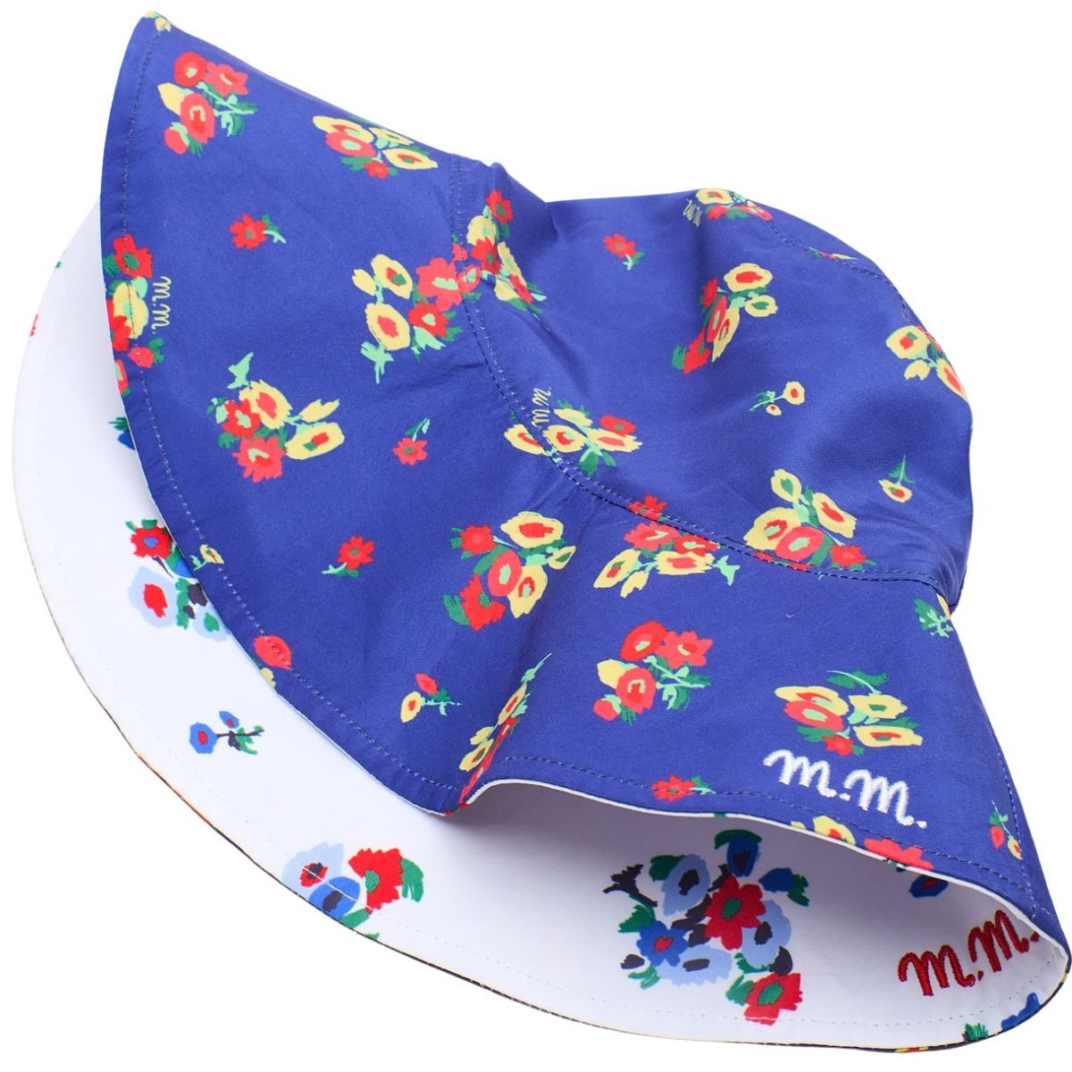 Maison Mangostan Blossom Reversible Sun Hat in blue floral print with white reversible side