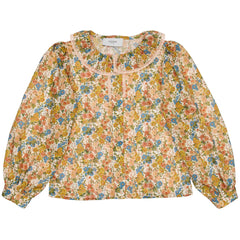 Paade Mode Alice Cotton Blouse With Frill Collar featuring a mustard floral print, frilled neck, and gathered sleeves.