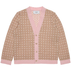 Paade Mode Morgan Merino Wool Cardigan featuring a beige and pink geometric jacquard knit, V-neckline, and pink ribbed trim.