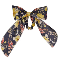 Paade Mode Lottie Hairband Cotton in deep navy floral print featuring an oversized bow design with long flowing tails.