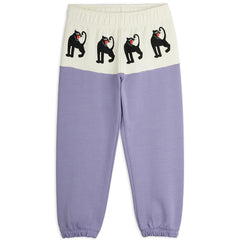 Panther Panel Sweatpants by Mini Rodini with panther print, elastic waist and ribbed cuffs.