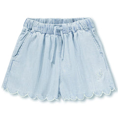 Addie Shorts from Molo in light blue chambray with elastic drawstring waist, scalloped hems, and relaxed summer fit