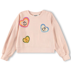The Miki Sweatshirt from Molo.  Pink sweatshirt with colorful heart-shaped smiley face designs.