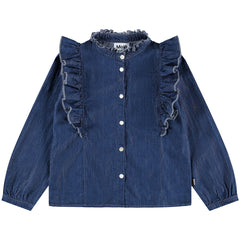 The Raphaella Shirt from Molo. Blue denim blouse with ruffled details.