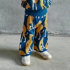Greyhound Pants from Momohanipopo. These are wide-leg knitted pants featuring a greyhound dog pattern.
