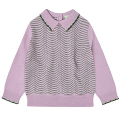 The Baby Pointelle Blouse from FUB. The body is knitted in a decorative pointelle pattern.