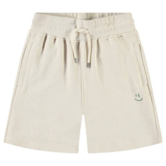 Alw Shorts from Molo. White baggy shorts with a wide elastic waistband and drawstring.