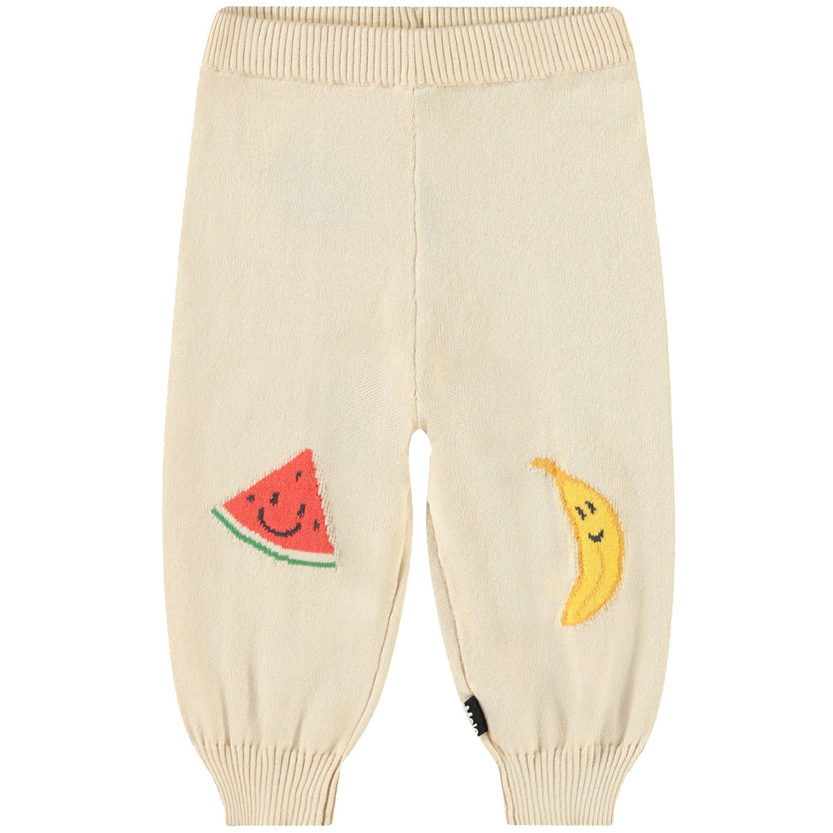 The Sol Pants from Molo. Featuring playful embroidered fruit faces—a smiling watermelon and banana.