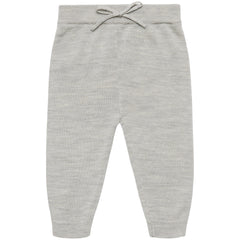 The Baby Pants from FUB featuring a soft single-jersey knit, low crotch fit, ribbed leg cuffs, and a waist bow detail.