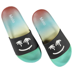 The Zhappy Sandals from Molo. Multi-colored swim sandals with black, smiling faces with sweet palm tree eyes