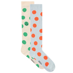 Norvina Socks from Molo. A playful pair of knee-high socks featuring bold polka dots.