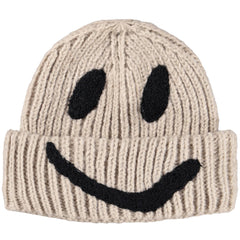 Kim Beanie by Molo with a beige ribbed knit design and black smiley face detail.