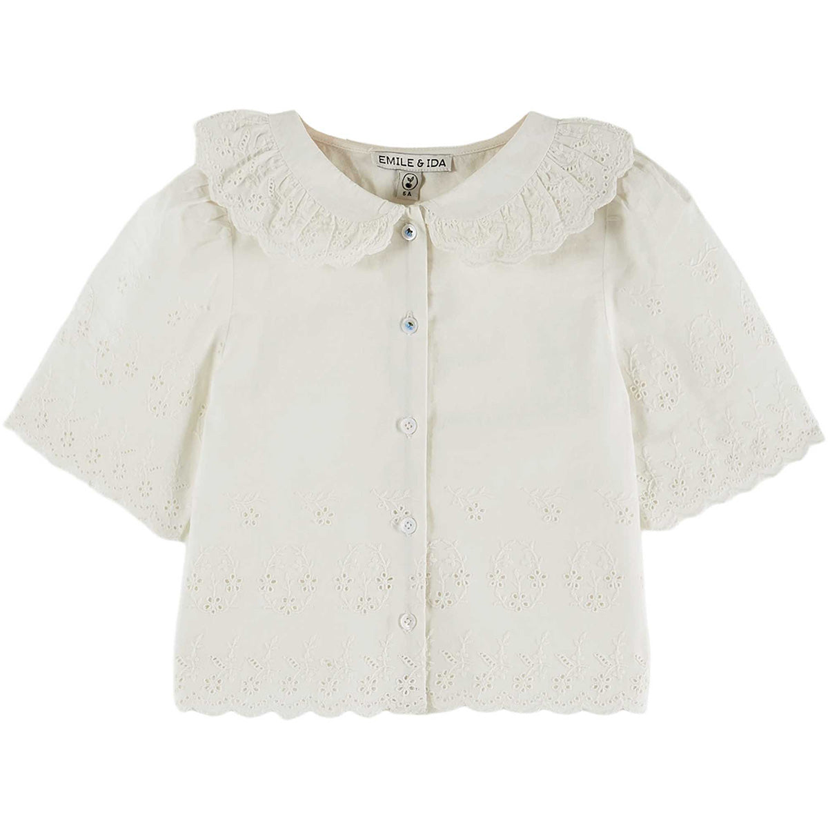 The English Embroidery Blouse from Emile et Ida. The straight cut is enhanced by tone-on-tone English embroidery.