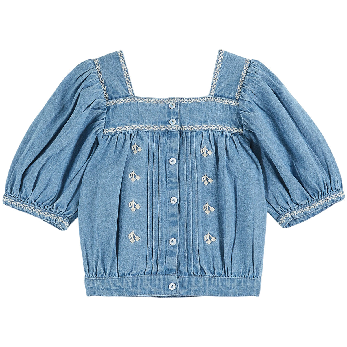 The Chambray Embroidered Blouse from Emile et Ida. Powder-beige cotton blouse dotted with bunches of flowers.